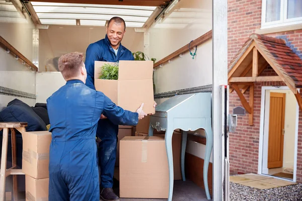 depositphotos 299151058 stock photo removal company workers unloading furniture Blog